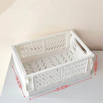 caisse rangement pliable plastique gris vert rose beige blanc grille ventilation moderne minimaliste poignées