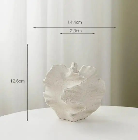 vase céramique porcelaine moderne beige clair relief sculptural plumes séchées fleur artificielle opaque organique
