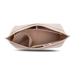 sac cosmétique moderne réutilisable beige noir rose pâle uni opaque poignée amovible compartiments intérieurs