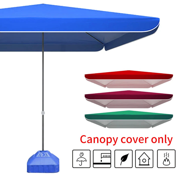 Voile d'ombrage de jardin rouge installée sur une terrasse avec salon de jardin