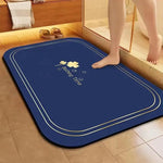 tapis bain antidérapant motifs floraux gris foncé bleu marine bordure dorée moderne textures