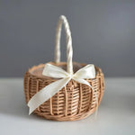 panier rotin tressé traditionnel beige clair poignée ruban blanc stockage rangement utilisation multipleDecorationFleurs