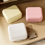 boîte pilules moderne blanc rose compartiments semaines verrouillable pratique adhésif organisateur médicaments portable