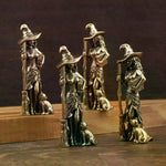 statues sorcières bronze texture métallique artisanal vintage finement détaillées balais chats chapeaux pointus