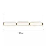 suspension lumineuse moderne minimaliste blanc doré rayures horizontales opacité câble noir chambre salonhôtel