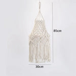 lampe suspendue boho macramé blanc cassé motifs géométriques boule bois franges decoration maison salon