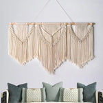 tapisserie macramé boho chic beige clair motifs géométriques franges crochet bois chambre salon
