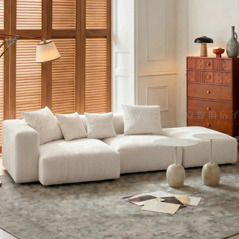canapé modulable moderne beige clair rayures horizontales convertible cause cœur lit salon