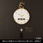 horloge murale moderne ornement cerf cadre doré aiguilles tissu noir pompon nouveau chinois
