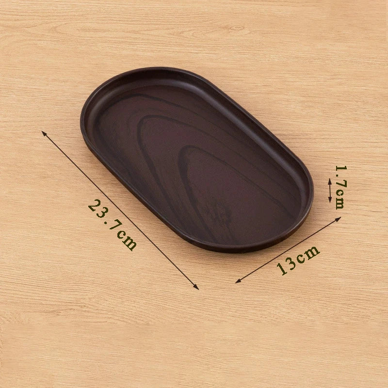 assiettes ovales bois marron texture naturelle moderne rangement pâtisseries organisation cuisine