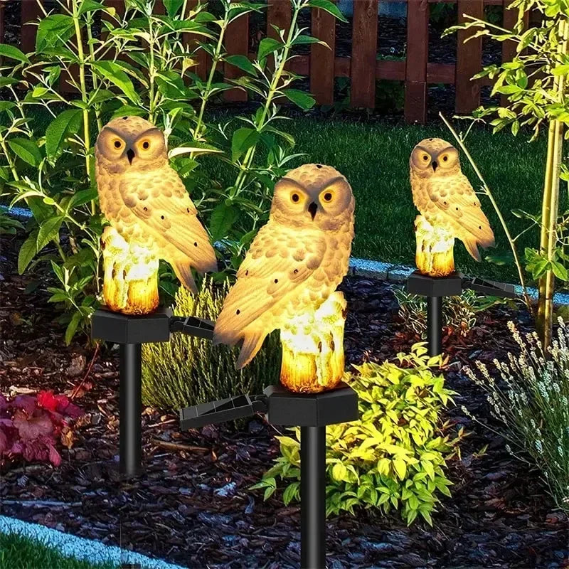 statues oiseaux solaires blanc marron texture plumes extérieur jardin lumineux réalistes