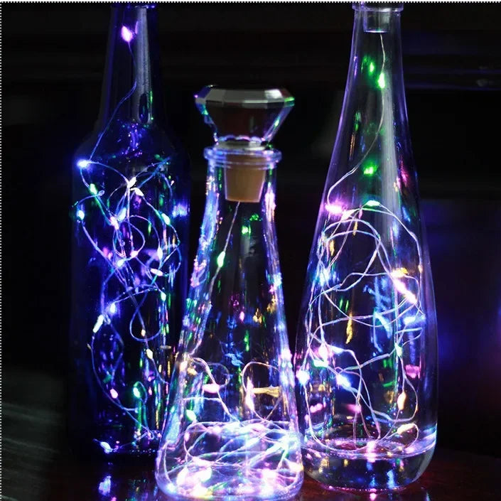 bouteilles lumineuses solaires transparentes fils colorés spirales moderne mariage déco festive