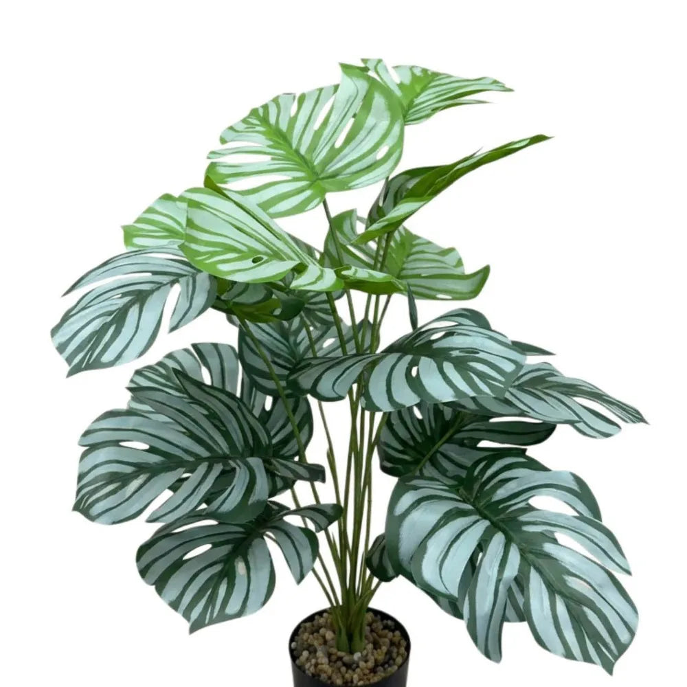 plantes artificielles grandes feuilles vertes blancs moderne tropicale décoration mur extérieur accrochées