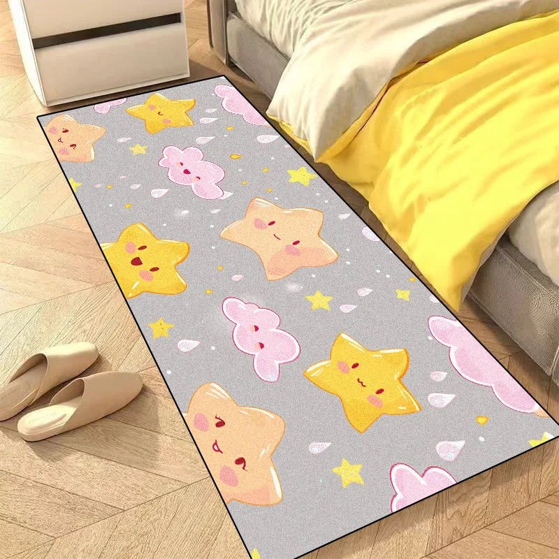 Tapis décoratif gris orné d'étoiles, de cœurs et d'autres motifs colorés dans une chambre d'enfant.