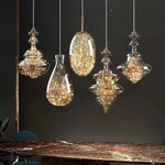 suspension lumineuse moderne transparente dorées câble suspendu élégante led trois couleurs chambre principale