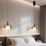 lustre moderne pendentif verre transparent effet fumé lumière blanc chaud salon chambrehôtel