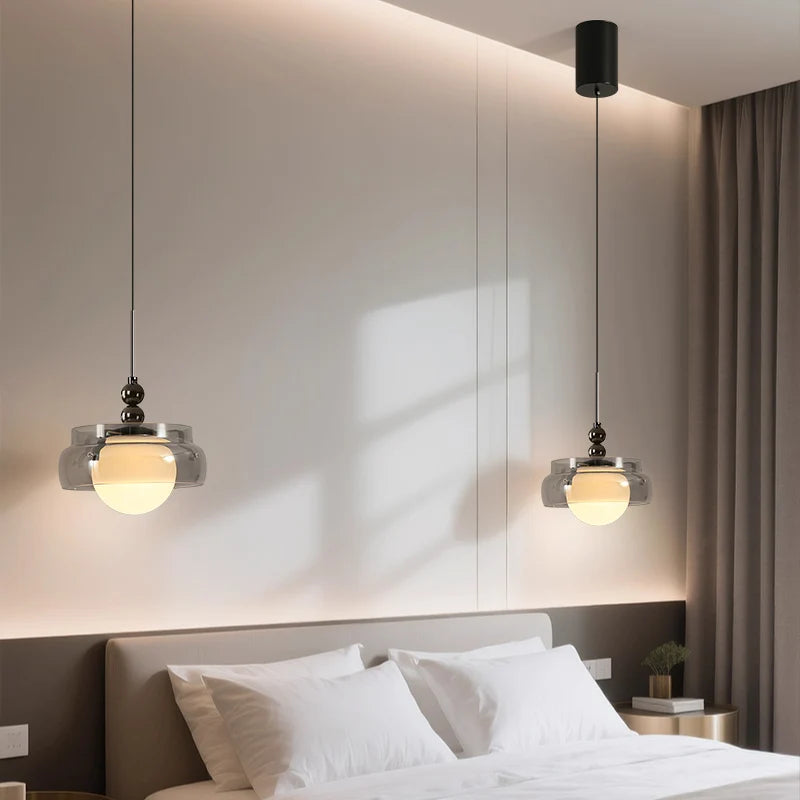 lustre moderne pendentif verre transparent effet fumé lumière blanc chaud salon chambrehôtel