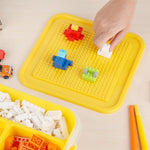boîtes rangement jouets plastique rouge bleu jaune vert modernes compartiments internes couvercle pratique