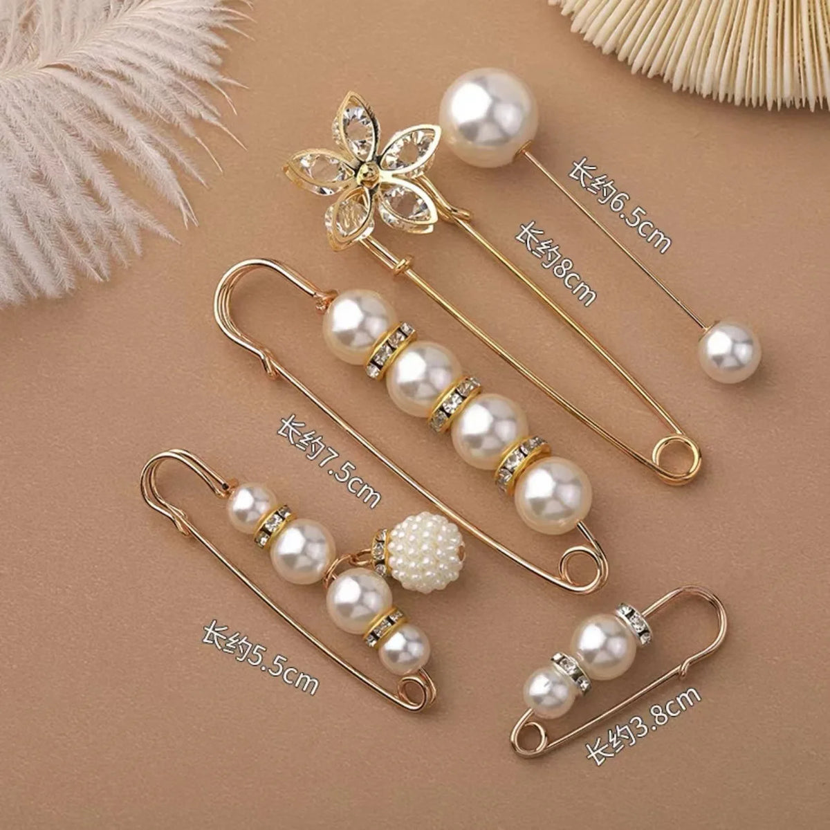 broches ornementales strass classiques élégantes clips or noires rouges