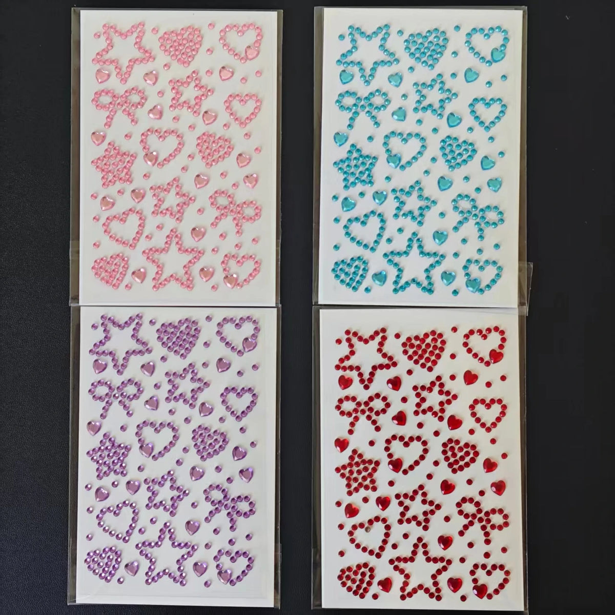 feuilles autocollantes motifs cœurs étoiles rubans abstrait rose jaune bleu violet rouge enfants