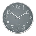 horloge murale moderne quartz aiguille cadran blanc cadre doré numeros 3d relief 10 12