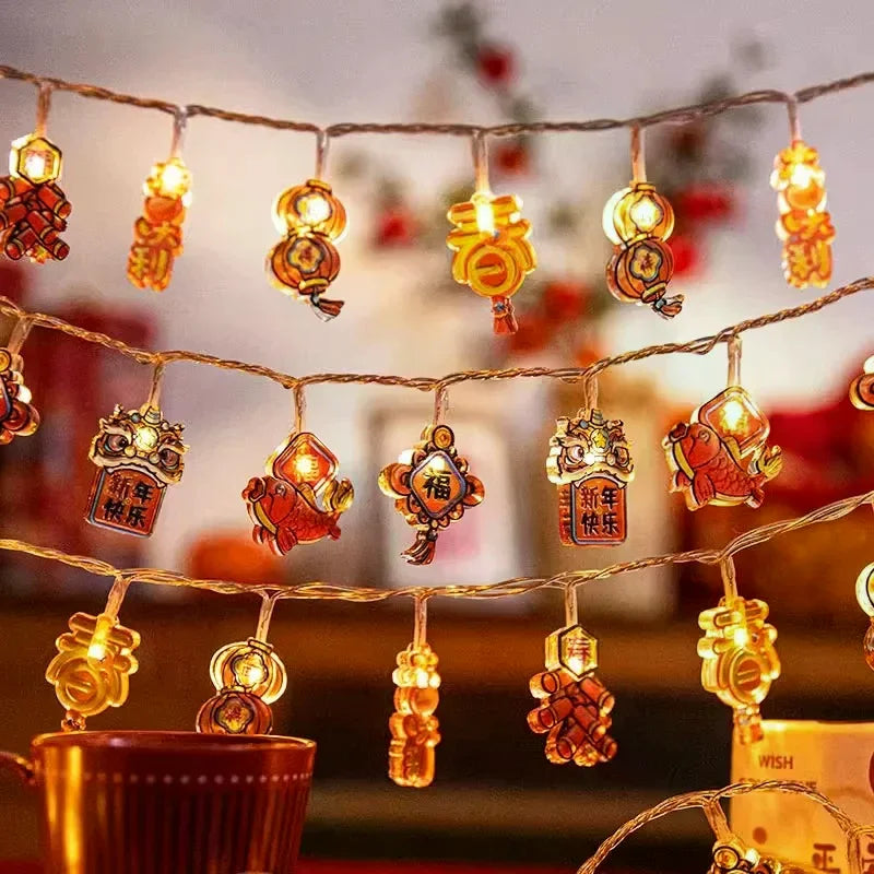 guirlande lumineuse chinoise festive lions poissons lanternes caractères rouges orange doré