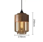 suspension lumineuse moderne pendentif verre noir transparent contemporain fixation câble luminaire salle manger chambre