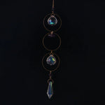 bijou pendentif cristal or bleu violet vert formes géométriques motifs oculaires translucides boho chic