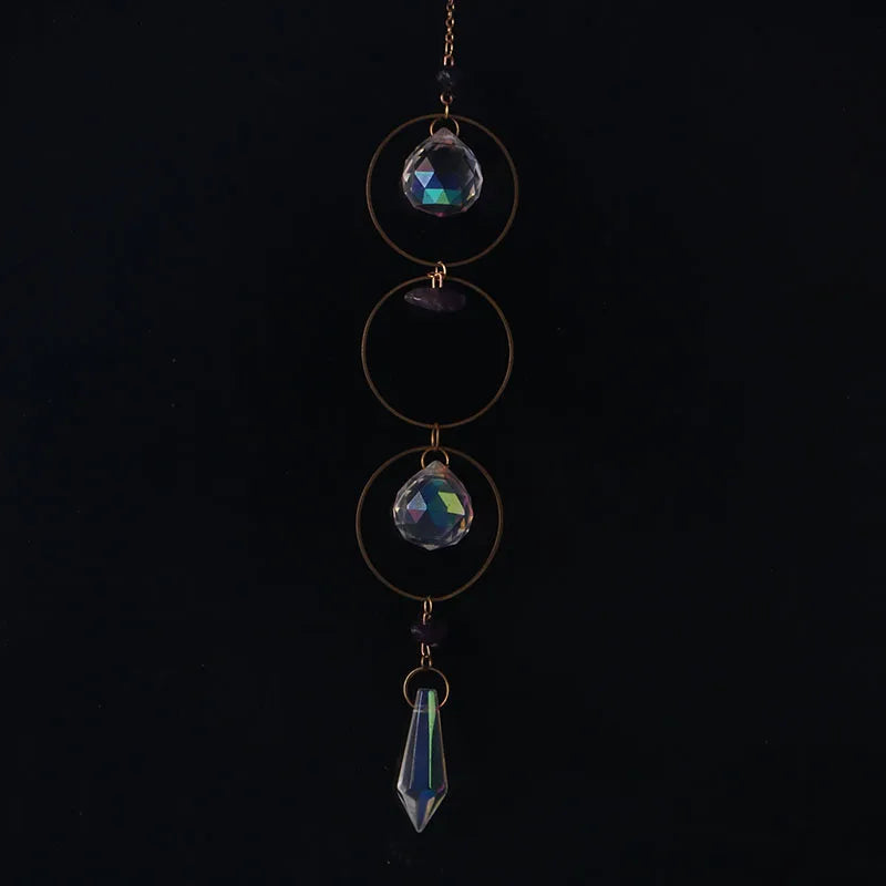 bijou pendentif cristal or bleu violet vert formes géométriques motifs oculaires translucides boho chic