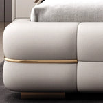 lit moderne minimaliste simili cuir gris clair structure bois vis matelassé chambre coucher