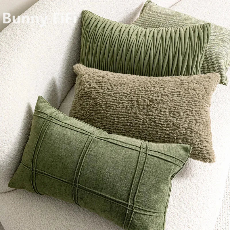 coussin vert olive rayures moderne décoration intérieure blanc motif géométrique noir plissé