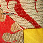 tapisserie décorative tibétaine motifs floraux franges colorées rouge jaune bleu vert blanc