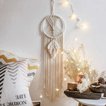 tapisserie macramé boho pompons franges beige clair tissé main décoration murale artisanal