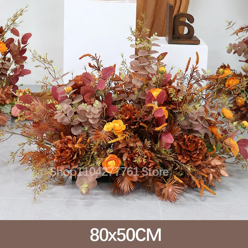 décoration événement mariage arc floral composition feuilles branches rustique automnale