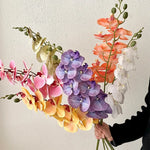 décoration intérieure vase orchidées artificielles fleurs douces feuilles vertes moderne élégant rose blanc violet