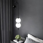 suspension lumineuse moderne sphères translucides structure métallique noir blanc