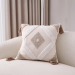 taies d'oreiller bohèmes géométriques texturées coussins décoratifs modernes pompons beige gris doré blanc