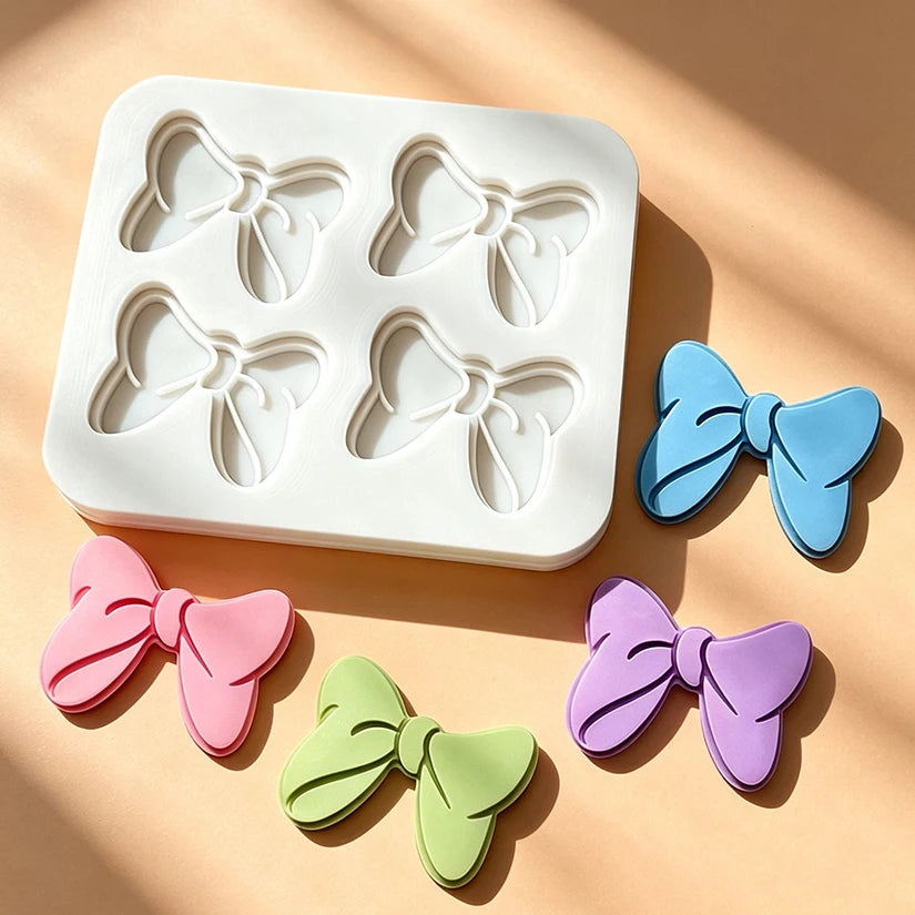 moule silicone nœuds papillons pâtisserie décorative couleurs variées fondant cupcakes