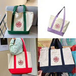 sacs toile colorés blanc vert violet rouge jaune logo trader joes poignées tissu casual