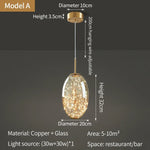 suspension lumineuse moderne transparente dorées câble suspendu élégante led trois couleurs chambre principale