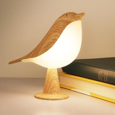 Lampe de chevet oiseau tactile couleur jaune sur table de nuit