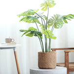 Pot plante tissé marron clair moderne rustique plante verte graines noires serviette blanche