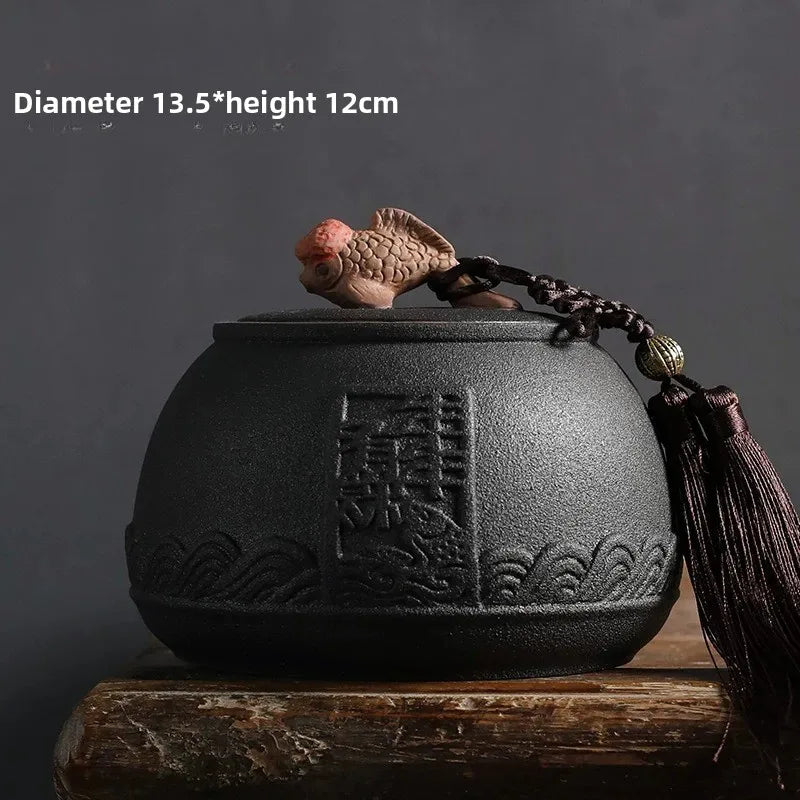 pot thé rouge jaune noir artisanal motifs floraux poisson chaîne pompon hermétique
