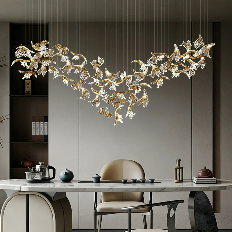 suspension lumineuse moderne élégante dorée feuilles stylisées transparente 120cm 170cm 200cm lumière chaude 3000k