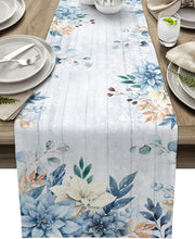 chimene table lin motif floral poinsettias bleues rustique decoratif festive