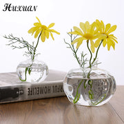vase decoratif grenade forme texturée transparent moderne fleurs feuilles eau bleue minimaliste