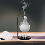 diffuseur huiles essentielles céramique moderne bol blanc poignée bougie parfumée salon minimaliste