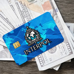 stylo bille bleu interpol logo globe épée carte bancaire