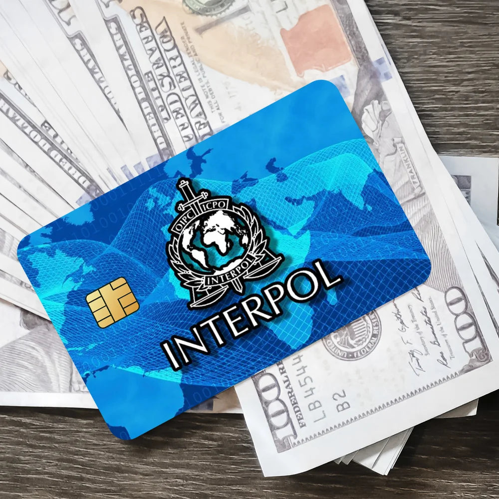 stylo bille bleu interpol logo globe épée carte bancaire