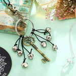 porte clés vintage pentagramme clé antique clochettes boho chic ornement métallique doré chaîne noire